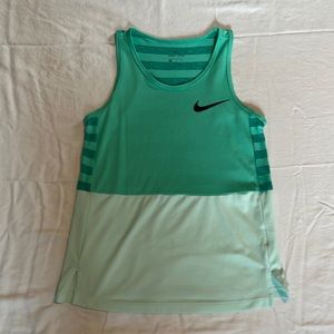 Nike dri-fit girls tank top, teal, girls medium, has been worn few times